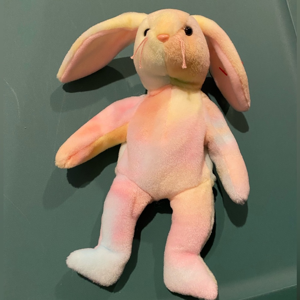 NWT BEANIE BABY - “Hippie” bunny, kept in collector case.